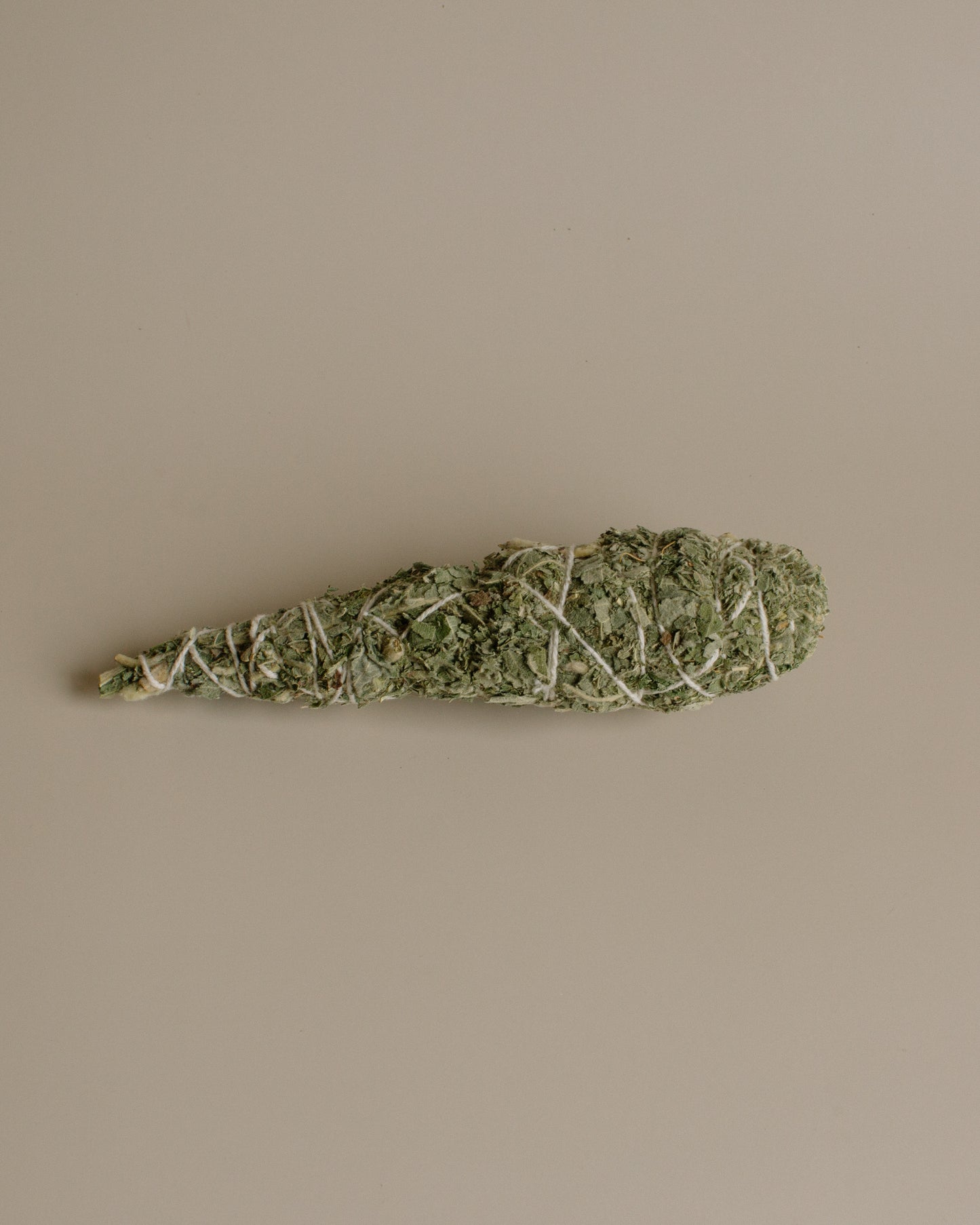 Cones of dried Himalayan Sage Smudges on a beige background