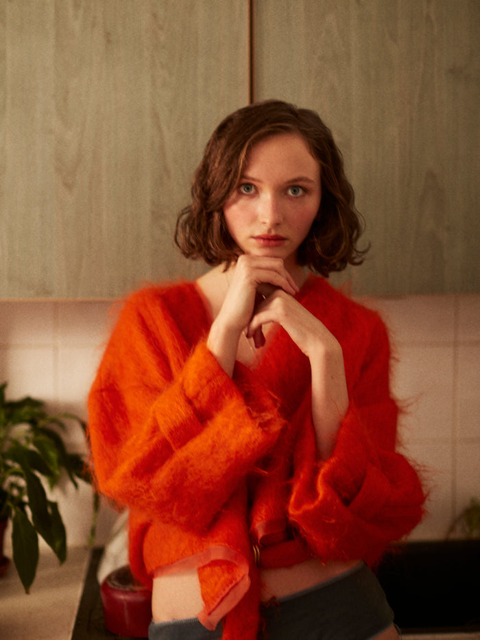 Glasshouse Salon Curly Bob hair cut editorial orange fluffy cardigan