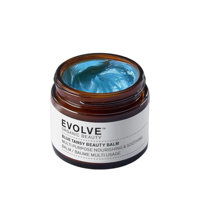 Jar of blue balm with 'Evolve' label on a white background