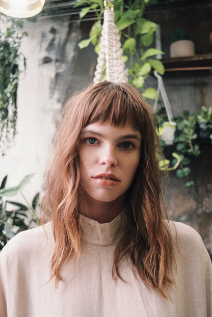 Glasshouse salon hair micro fringe model with bangs and natural hair texture