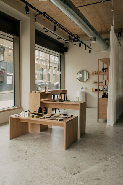 Glasshouse salon retail area with organic and natural beauty products East London
