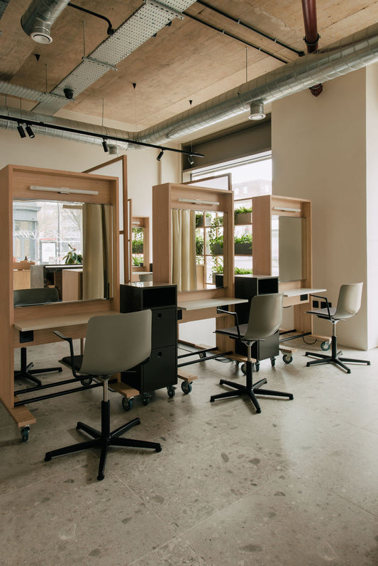 Glasshouse Hair Salon East London. Three stations with hairdressing chairs and mirrors. 