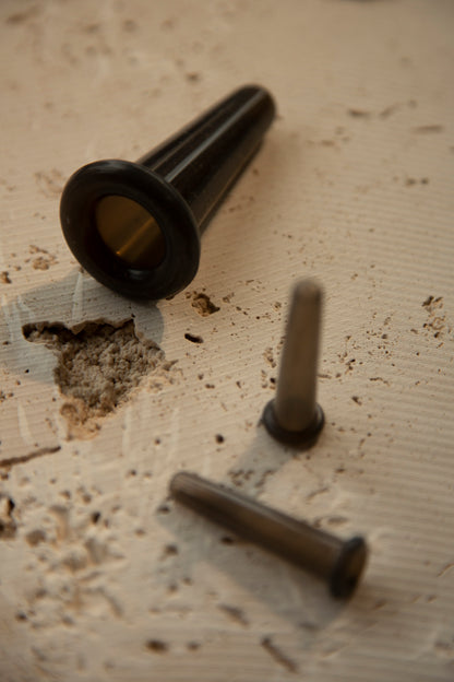 Three black Facial cuppling tools for holisitc facials in east London