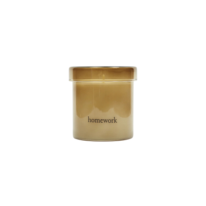 Jar labeled 'homework' with a gold lid on a white background