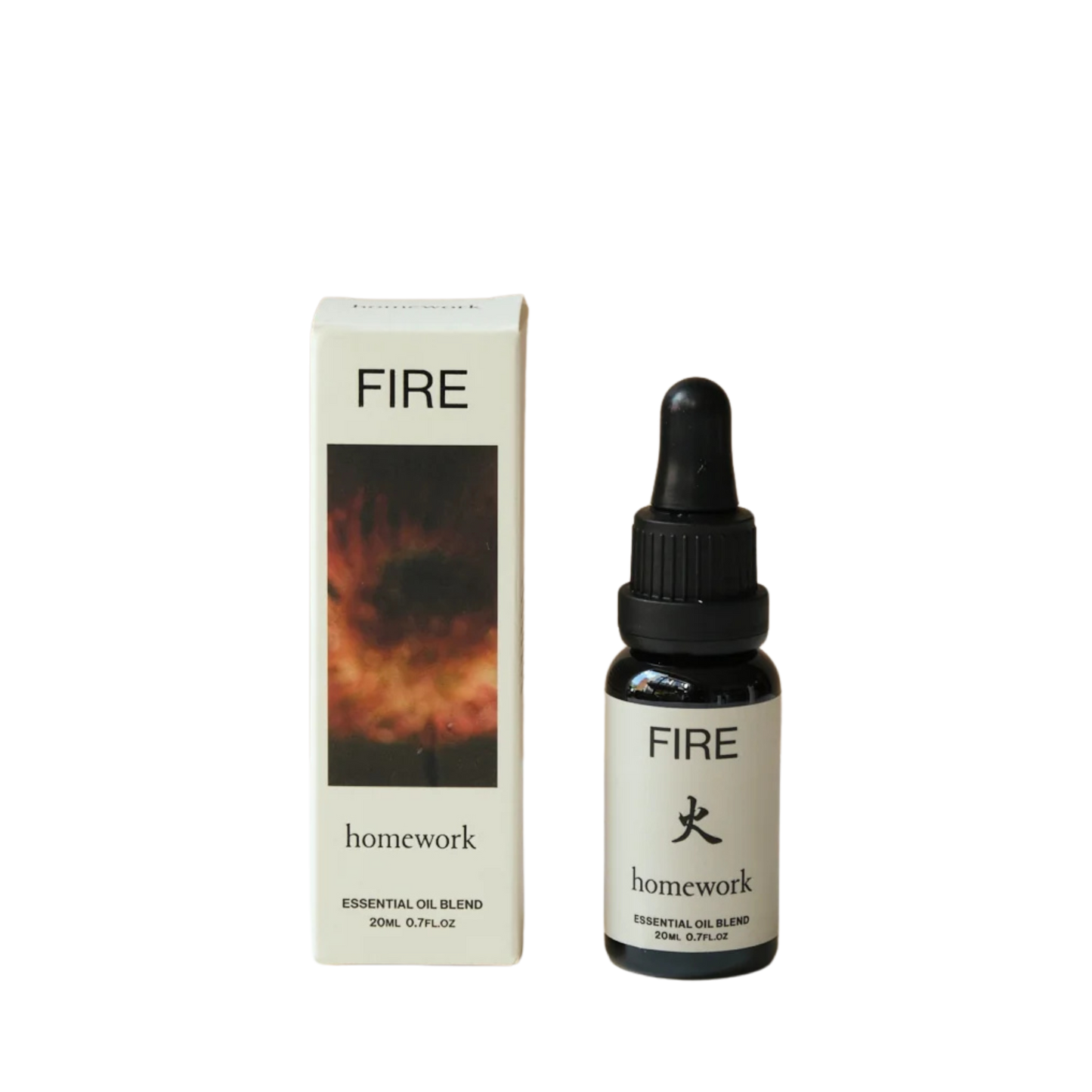 Essential oil blend bottle and packaging labeled 'FIRE homework' on a white background