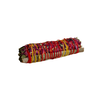 Rolled sage with colorful ribbons on a white background