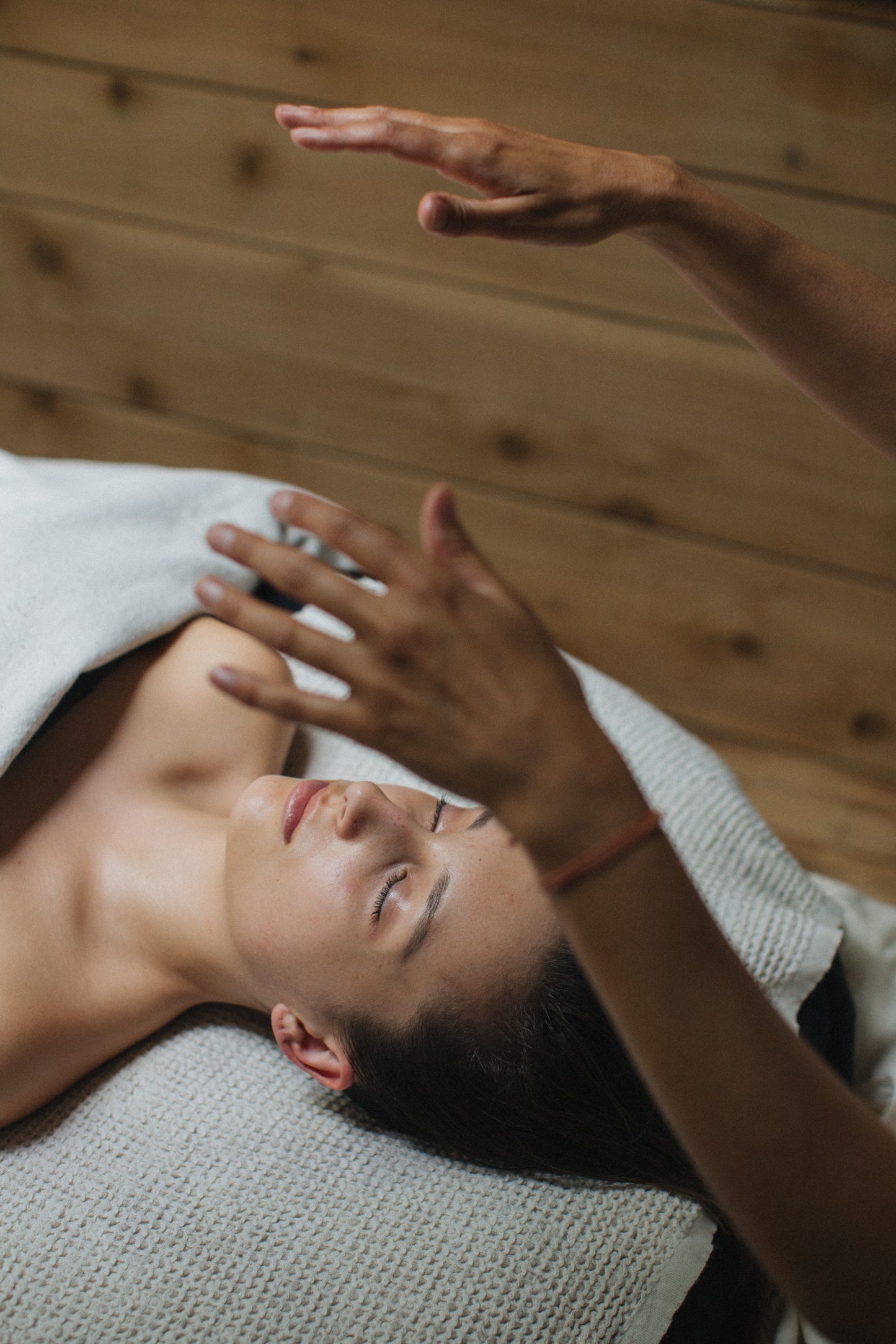 Reiki practitioner giving energy healing session East London