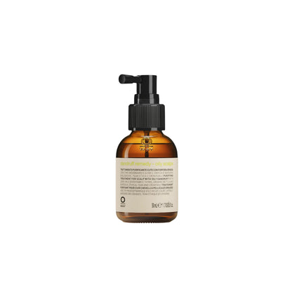 Brown bottle of Oway dandruff remedy with pump on a white background