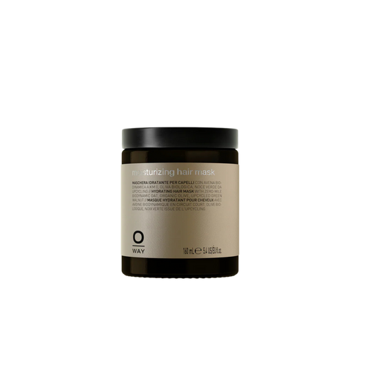 Moisturizing hair mask jar with black lid on a white background