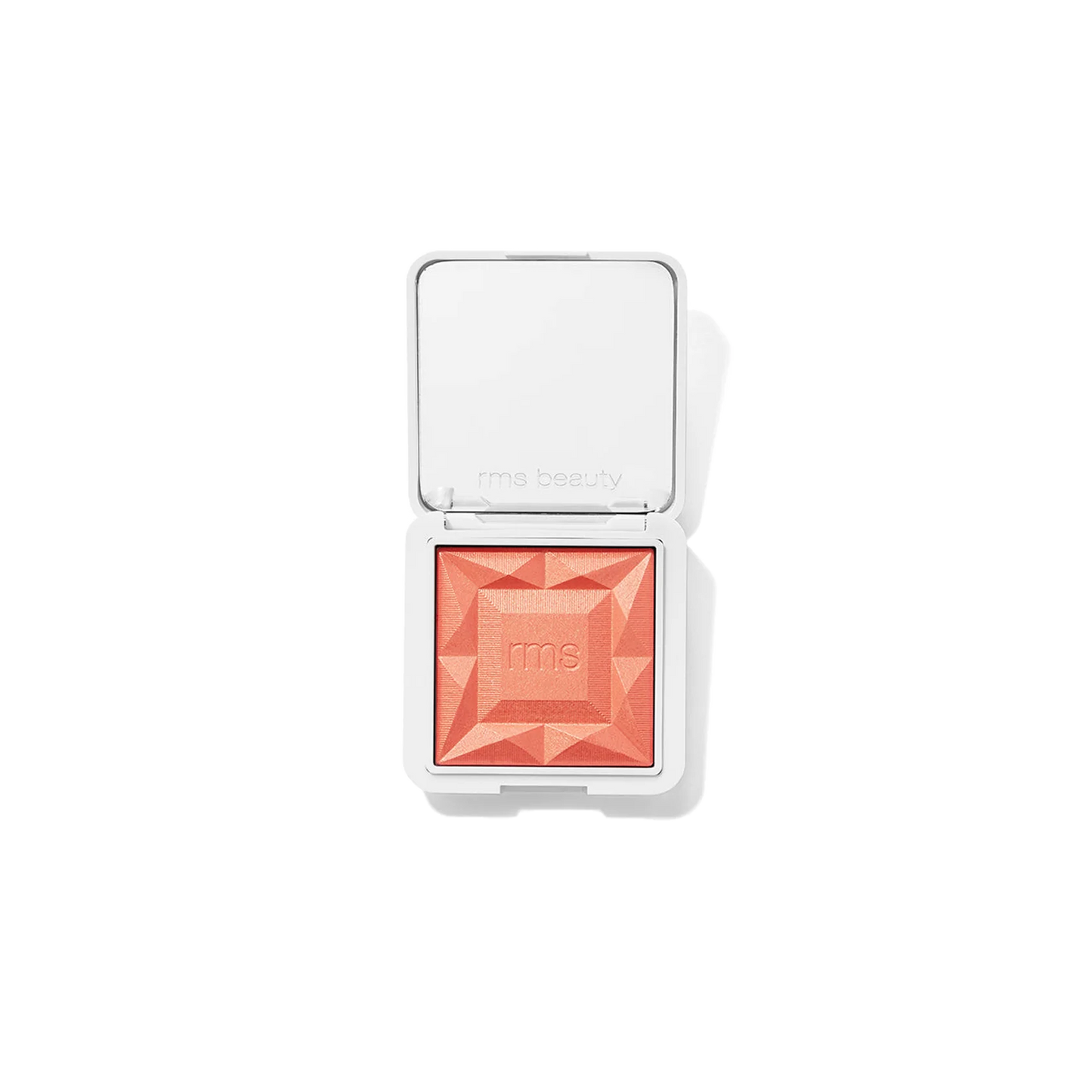 RMS Beauty diamond-shaped pressed powder blush in a coral-peach shade, Mai Tai shown in an open white compact with a mirror on a clean white background.
