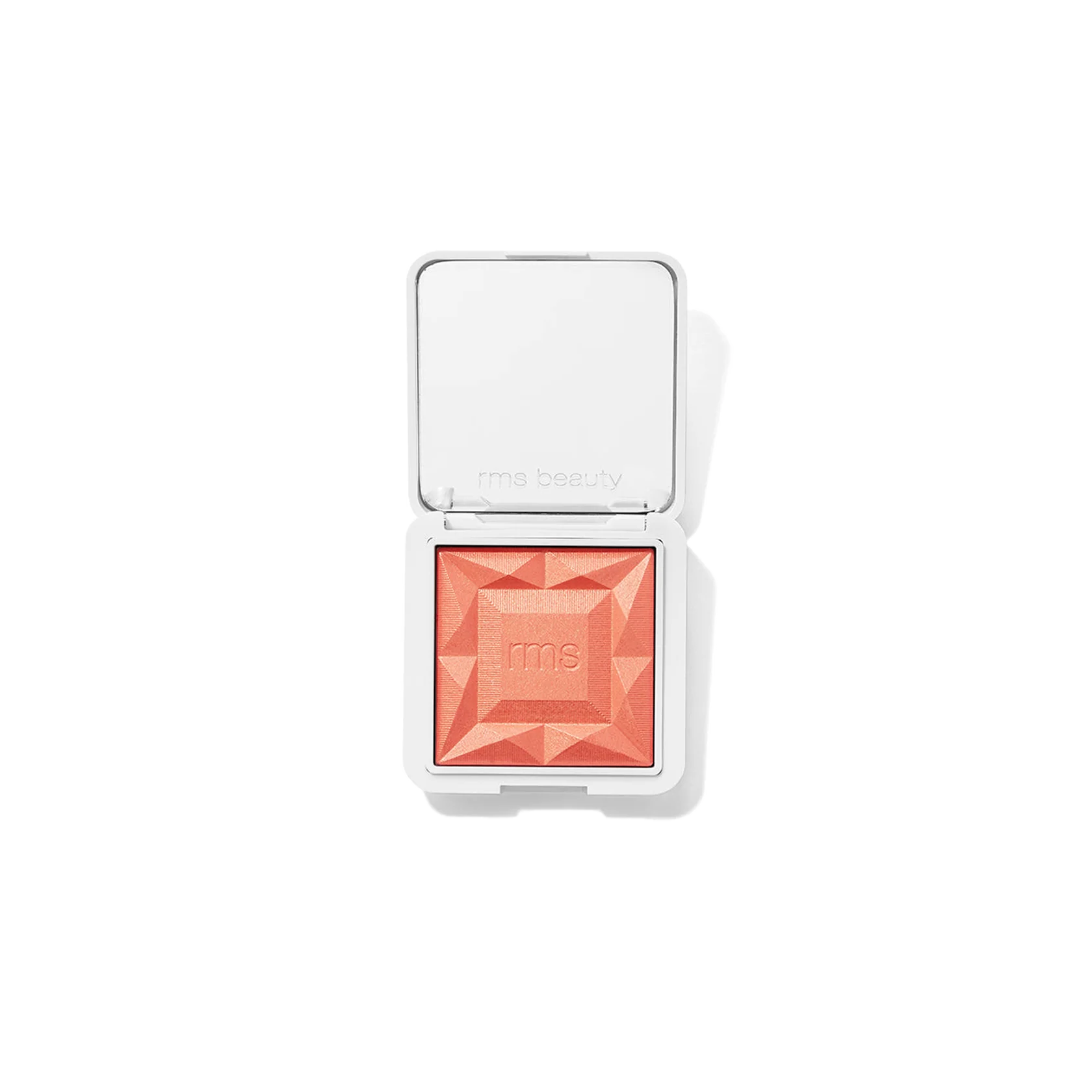 RMS Beauty diamond-shaped pressed powder blush in a coral-peach shade, Mai Tai shown in an open white compact with a mirror on a clean white background.