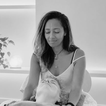 Shelana Angelic Reiki and Craniosacral practitioner performing treatment at Glasshouse salon in East london