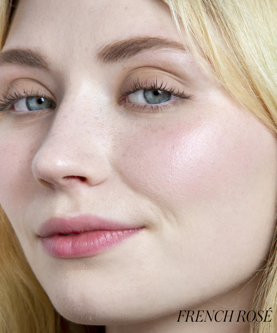 Close-up of a person's face with 'French Rosé' text