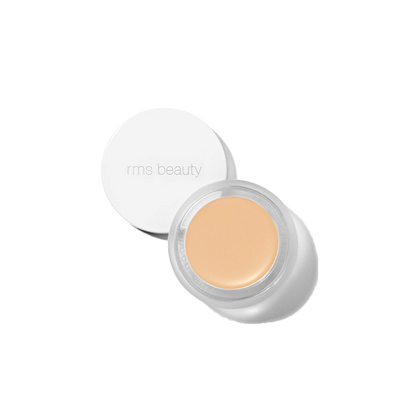 RMS Beauty UnCover-Up cream concealer in shade 11 pale ivory with golden base in clear glass jar on transparent background