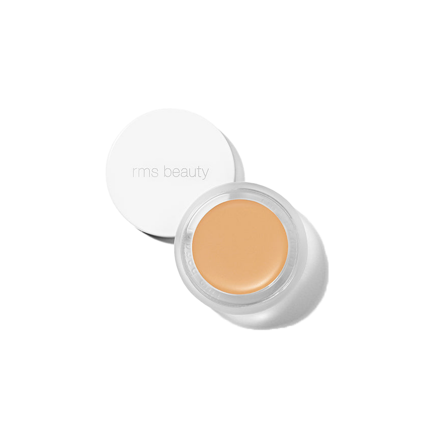 RMS Beauty UnCover-Up cream concealer in shade 22.5 cool buff beige in clear glass jar on transparent background