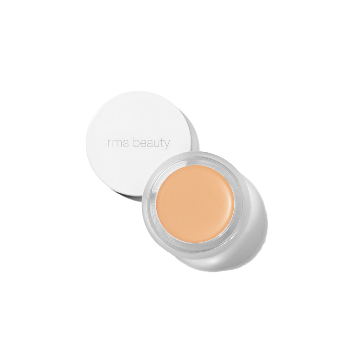 RMS Beauty UnCover-Up cream concealer in shade 22 light medium yellow base in clear glass jar on transparent background