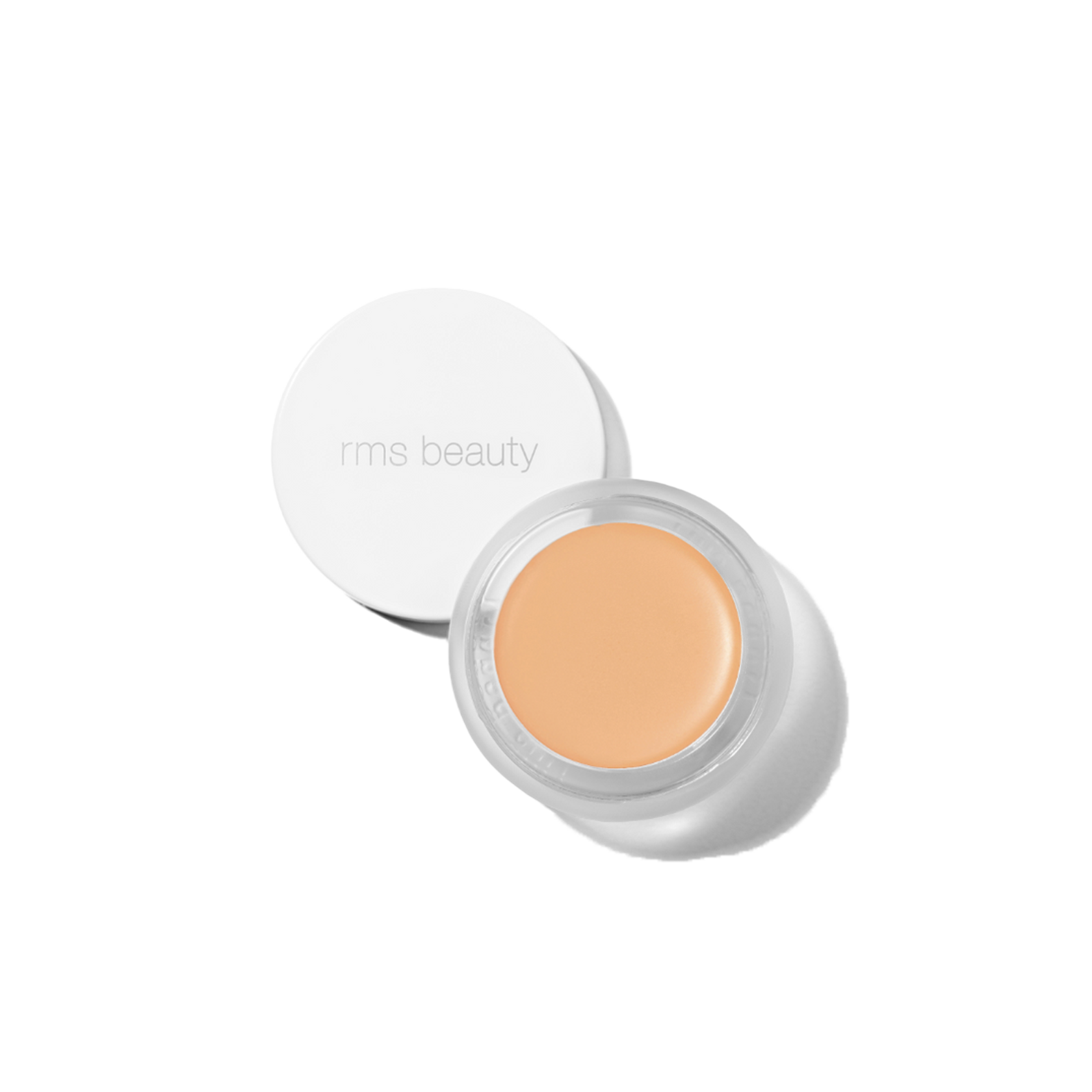 RMS Beauty UnCover-Up cream concealer in shade 22 light medium yellow base in clear glass jar on transparent background