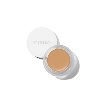 RMS Beauty UnCover-Up cream concealer in shade 33.5 warm tawny peach corrector in clear glass jar on transparent background