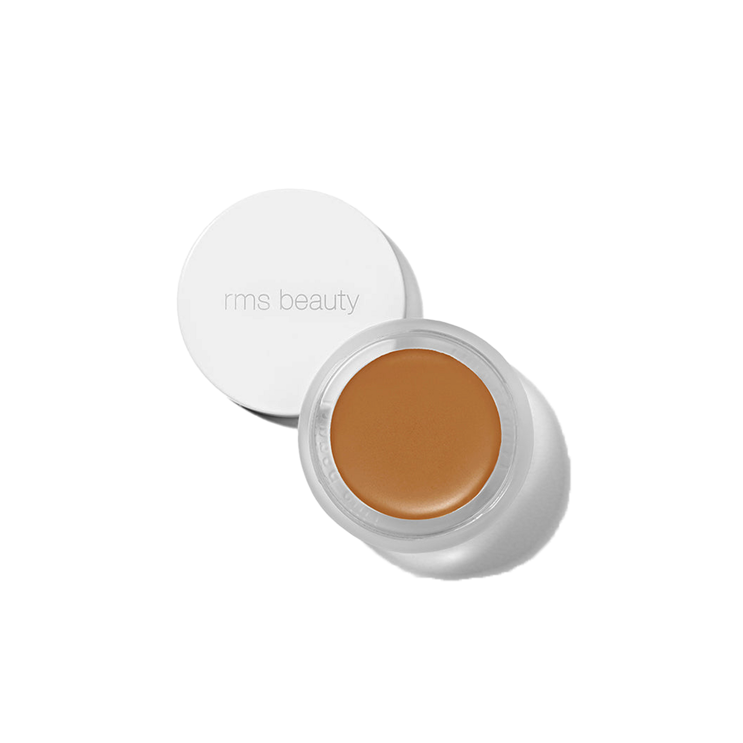 RMS Beauty UnCover-Up cream concealer in shade 66 golden sienna in clear glass jar on transparent background