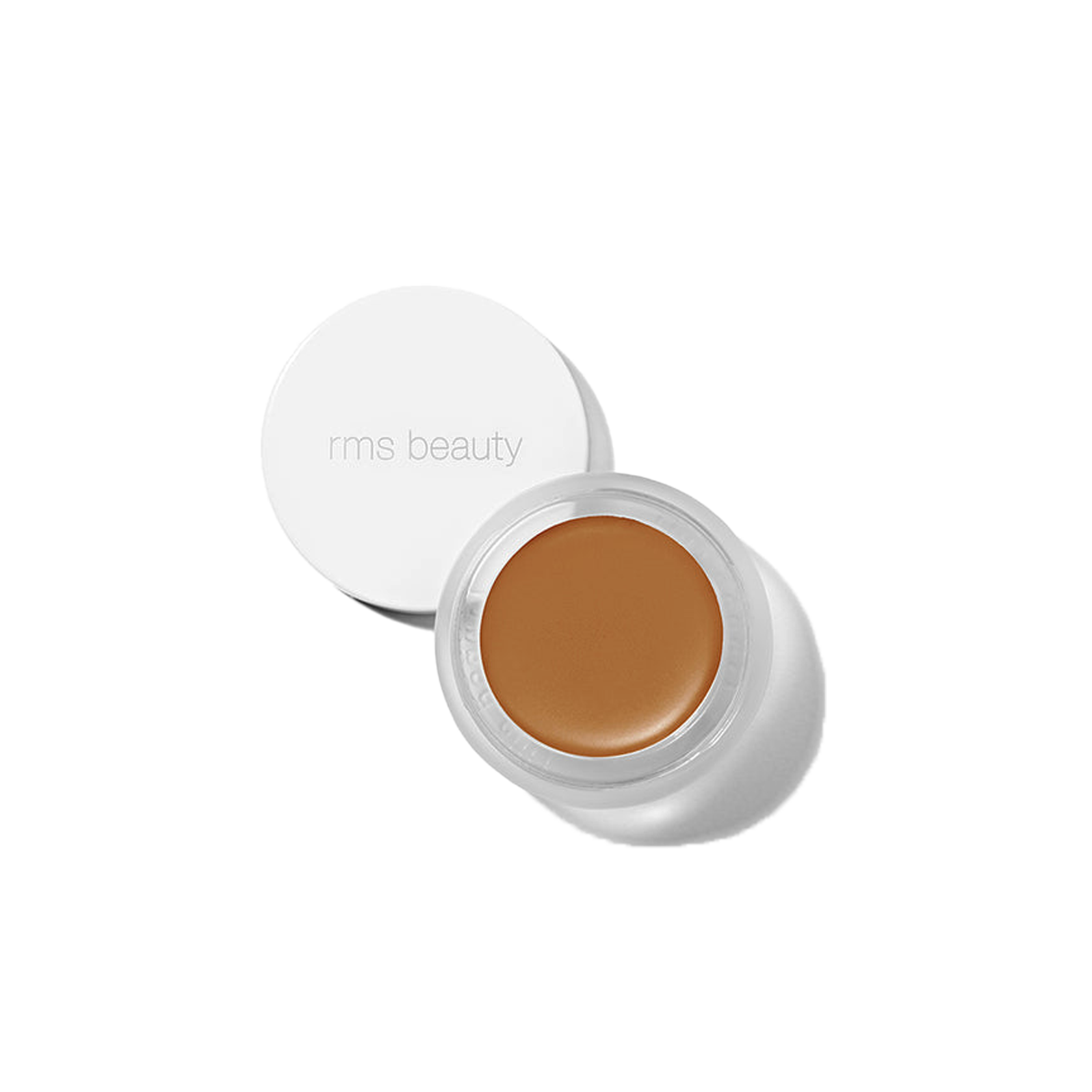 RMS Beauty UnCover-Up cream concealer in shade 77 deep sienna in clear glass jar on transparent background