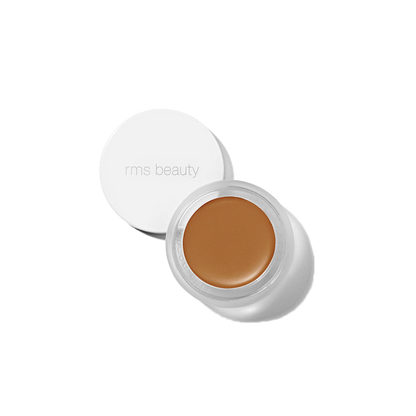 RMS Beauty UnCover-Up cream concealer in shade 77 deep sienna in clear glass jar on transparent background