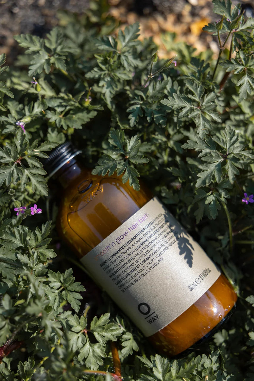 smooth'n glow hair bath OWAY in a bed of natural plant life italy 