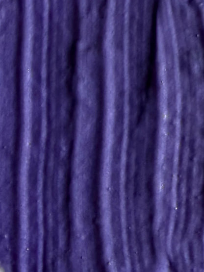 Close-up texture swatch of WIIG Blonde 0/01 Toning Treatment showing the rich, deep violet-pigmented cream for ash blonde hair.