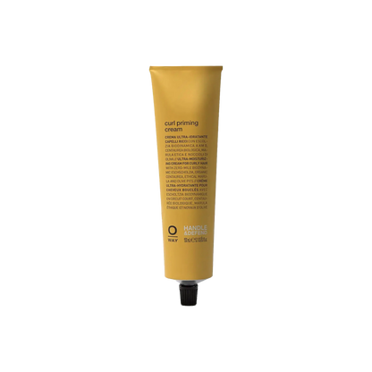 A tube of Curl Priming Cream by OWAY designed for curly hair, with organic and cruelty-free indications.